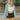 Frontal view of the Sloane Corduroy Shacket that features a jade green corduroy material, a collar neckline, a button-up front, a front pocket, and long cuffed sleeves.