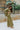 Side view of the All Your Life Pants that features a green satin material, a high-rise fit, a thick elastic waist band with an adjustable tie, and a wide leg fit.