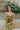 Frontal view of the All Your Life Brami that features a green satin material, a V neckline, a sleeveless design with thin adjustable straps, and a smocked back.