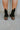 The Better Than The Rest Bootie features a black colored suede upper, dual paneling on the shaft with elastic gores, a platform lug sole, a stacked platform heel, and a heel tab for easy on-off wear.