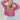 Frontal view of the Stay Cozy Top that features a pink colored thermal material, a round neck, long cuffed sleeves, exposed hems through out, a lettuce edge bottom hem, and a flowy fit.