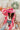 The Road Less Traveled Hat is a wide brim hat, featuring a hot pink fabric, a white aztec pattern belt, and adjustable ties within for different fit.