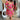 Full body view of model wearing the Best Memory Floral Dress which features hot pink, light pink, orange, yellow green and white fabric with a floral and gingham pattern, ruffle trim, a mini length hem, pink lining, a sweetheart neckline, a smocked back, 