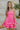 Front view of model wearing the She's Everything Dress that has hot pink fabric, mini length, a three-tiered ruffle skirt, a square neckline, adjustable straps, and a back zipper with a hook closure.