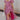 Full body view of model wearing the Falling For You Floral Dress which features berry pink, purple, green and white sheer fabric, floral print, berry pink lining, front slit, ruffle layered hem, sweetheart neckline, short puff sleeve with ruffle hem and m