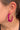 Side view of model wearing the Full of Life Hoops in Fuchsia which features large, open fuchsia hoops with small and large fuchsia beads.