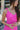 Close upper front view of model wearing the Sweet Summertime Dress that features hot pink fabric, a v-neckline, and tie straps