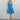 Full body front view of model wearing the Heat Wave Halter Dress that has blue fabric, a two-tiered skirt, mini length, a halter neck with a tie around the neck, an open back with smocking, and a sleeveless design