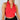 Front view of model wearing the Jada Red Cropped Racerback Tank Top that has red knit fabric, a cropped waist, built-in padding, a v-neckline with a collar, and a sleeveless design.