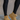 Frontal side view of model wearing the Oamira Beige Suede Platform Booties that have camel suede uppers with beige faux-fur lining and 2 inch platform soles.