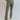 Front view of model wearing the Forget It Ribbed Pants that have olive green ribbed fabric, an elastic waistband, and flared legs.