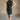 full body front view of model wearing the Alessandra Hunter Green Sleeveless Mini Dress that has hunter green knit fabric, mini length, a mock neckline, and sleeveless design.