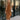 Front view of model wearing The Maria A-Symmetrical Cognac Party Dress features pale brown with a gold shimmer fabric, asymmetrical hem, pale brown lining, side cut out design with ruched design, one -shoulder strap, monochrome side zipper with hook closu