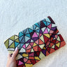 Front view of the Mosaic Glam Clutch which features multi color beaded with a dimensional pattern.