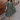 Full body view of model wearing the Selene Olive Gauze Midi Long Sleeve Dress features dusty olive gauze fabric, midi length, three tiered design, plunge neckline, smocked back and long sleeves with elastic cuffs.