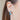 Model is wearing the Paint The Town Earring in Blue that have blue mini open shaped hoop with gold dots.