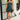Full body front view of model wearing the Party Time Ruched Teal Strapless Mini Dress that has textured teal fabric, mini length, side ruching, a strapless neck and a back zipper with a hook closure