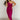 Full body front view of model wearing the Tiffany Fuchsia Ruched One-Shoulder Midi Dress that has fuchsia stretchy semi-satin fabric, ruched details, a one-shoulder neckline, and a side zipper.