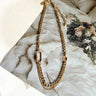The Golden Vibes Necklace features matte gold double chain layer and one large gold chain link.