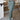 Front view of model wearing the On The Go Jogger Pants, that have olive fabric, ruched detailing on the sides, two front pockets, two back pockets, an elastic waist band with a tie closure, and elastic ankles