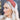 Side view of model wearing the Sadie Headband in Rust, which features a structured band with a satin lining and a quilted exterior with a top twist.