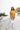 Full body view of model wearing the Fireside Feels Sweater which features honey fabric, a high-low hemline, one pocket on the left chest, a round neckline, and long sleeves.