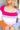 Close up view of Whitney Color-Block Sweater which features pink, white, blue, purple and orange ribbed stripe fabric, a cropped waist, a square neckline, and long sleeves.
