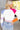 Back view of Whitney Color-Block Sweater which features pink, white, blue, purple and orange ribbed stripe fabric, a cropped waist, a square neckline, and long sleeves.