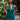 Close up front view of model wearing the Skylar Satin Dress in Teal which features teal satin fabric, halter neckline with a tie, ruching on the sides, back zipper with hook closures and lining.