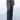 Front view of model wearing the Wish Upon A Star Pants, that have black fabric with metallic silver threads, an elastic band, and flared legs.