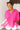 Frontal view of the Summer Chapter Top that features a hot pink colored material, a collared neckline, an oversized half sleeve, and a button down front.