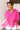 Frontal view of the Summer Chapter Top that features a hot pink colored material, a collared neckline, an oversized half sleeve, and a button down front.