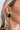 The Love To Love Earring is a black, stud earring featuring a heart shape outlined in white.