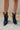 Front view of the Zane Western Bootie features a black leather upper, an almond toe, western inspired embroidery through out, side pull tabs for easy entry/exit, and a 3" block heel.