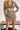 Frontal view of the It Takes Two Skirt that features a beige colored tweed material, a brown and black gingham print, a high-rise fit, a thick waist band, a curved bottom hem, a side zipper closure, and a mini length.