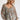 Frontal view of the Above All Else Top that features a blue colored material with a multi-colored floral print, a V neckline, a long sleeve, a ruched bust, and a flowy fit.