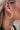 The Better Together Earring is a clear acrylic hoop style earring featuring gold and multi-colored specs through out.