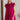 Frontal view of the Perfect Pair Dress that features a magenta material, a high rounded neckline with a ruffle detail, a short ruffle sleeve, a pleated top, a tiered design, a back button closure, a flowy fit, and a mini length.