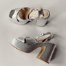 Ariel view of Funkie Platform Heels features silver criss cross strap, platform sole, block heel and adjustable ankle straps.