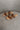 Side view of the Beach by Matisse Amalia Flat Sandal in Tan which features light brown braided upper, two straps, slide-on style and flat sole. 