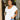 Frontal view of the Got Your Back Top that features a white gauze material, straight neckline, a short ruffle sleeve, frayed stitching details through out, and a flowy fit.